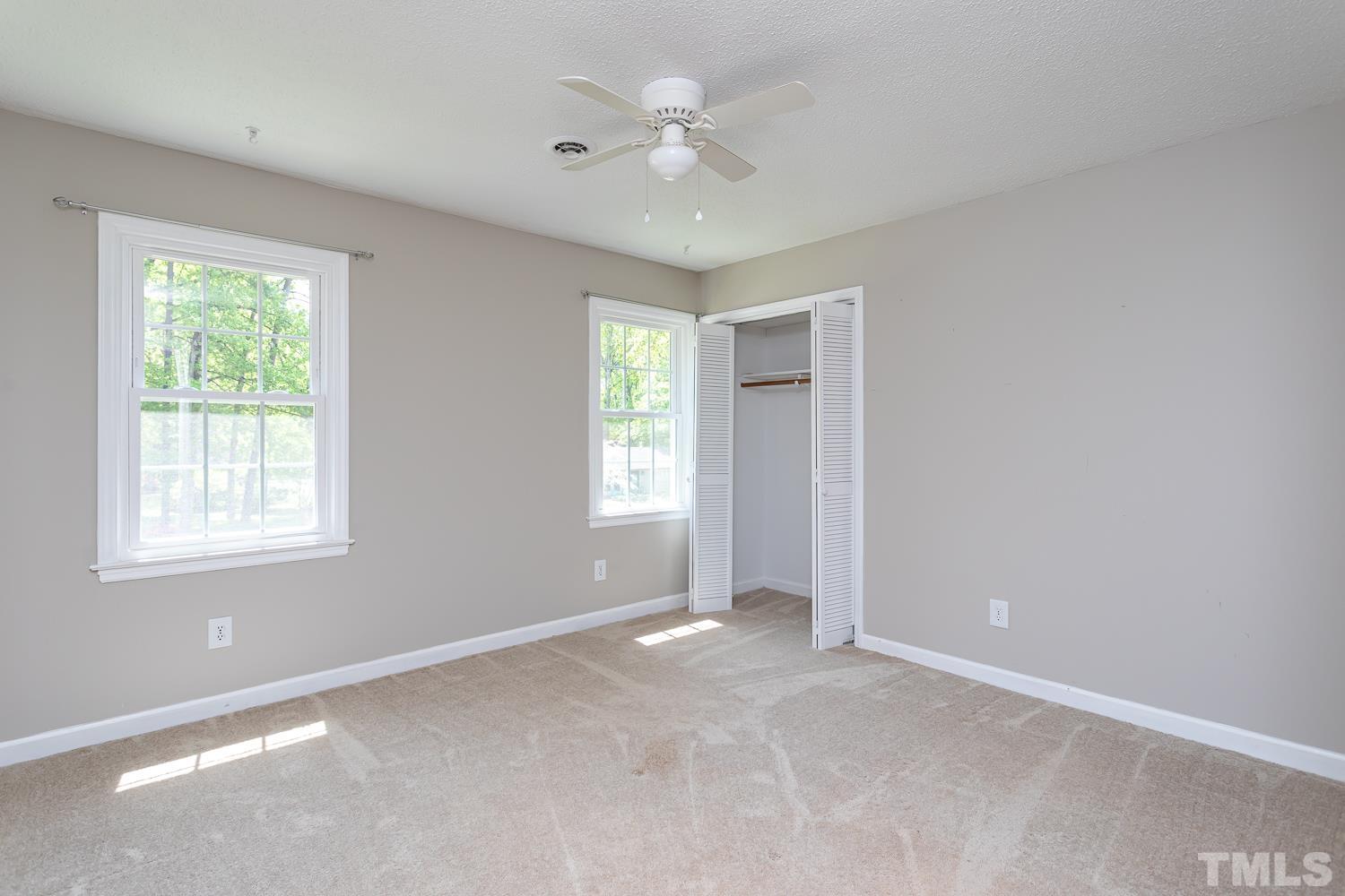 1304 Lake Pine Drive Cary, NC 27511 - Photo 17 of 26 a view of an empty room with a window