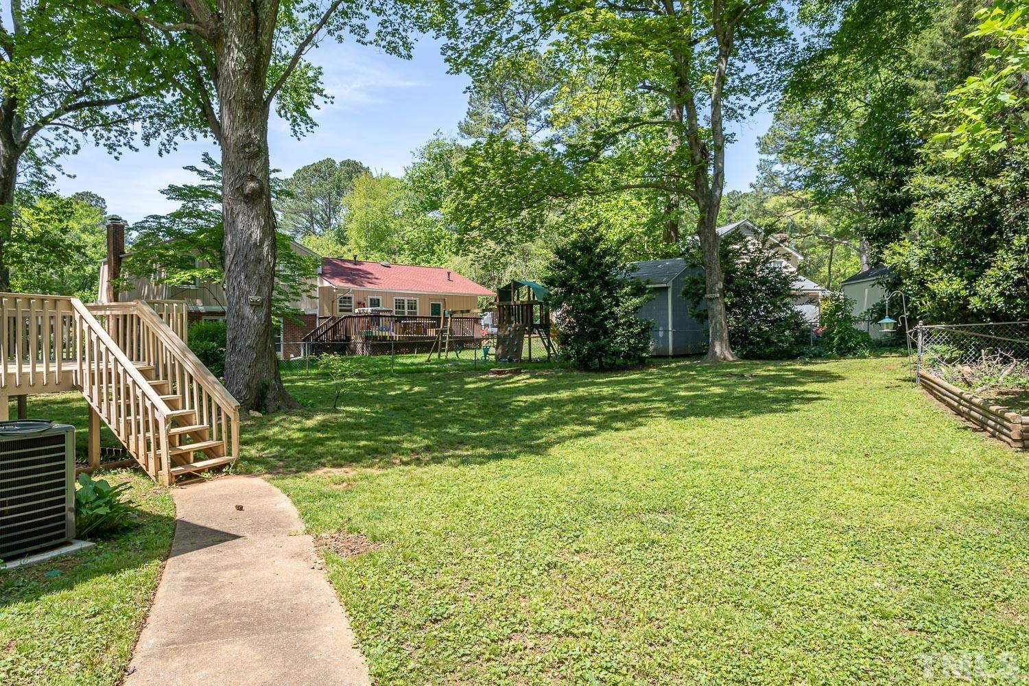 1304 Lake Pine Drive Cary, NC 27511 - Photo 26 of 26 a view of a patio with a yard