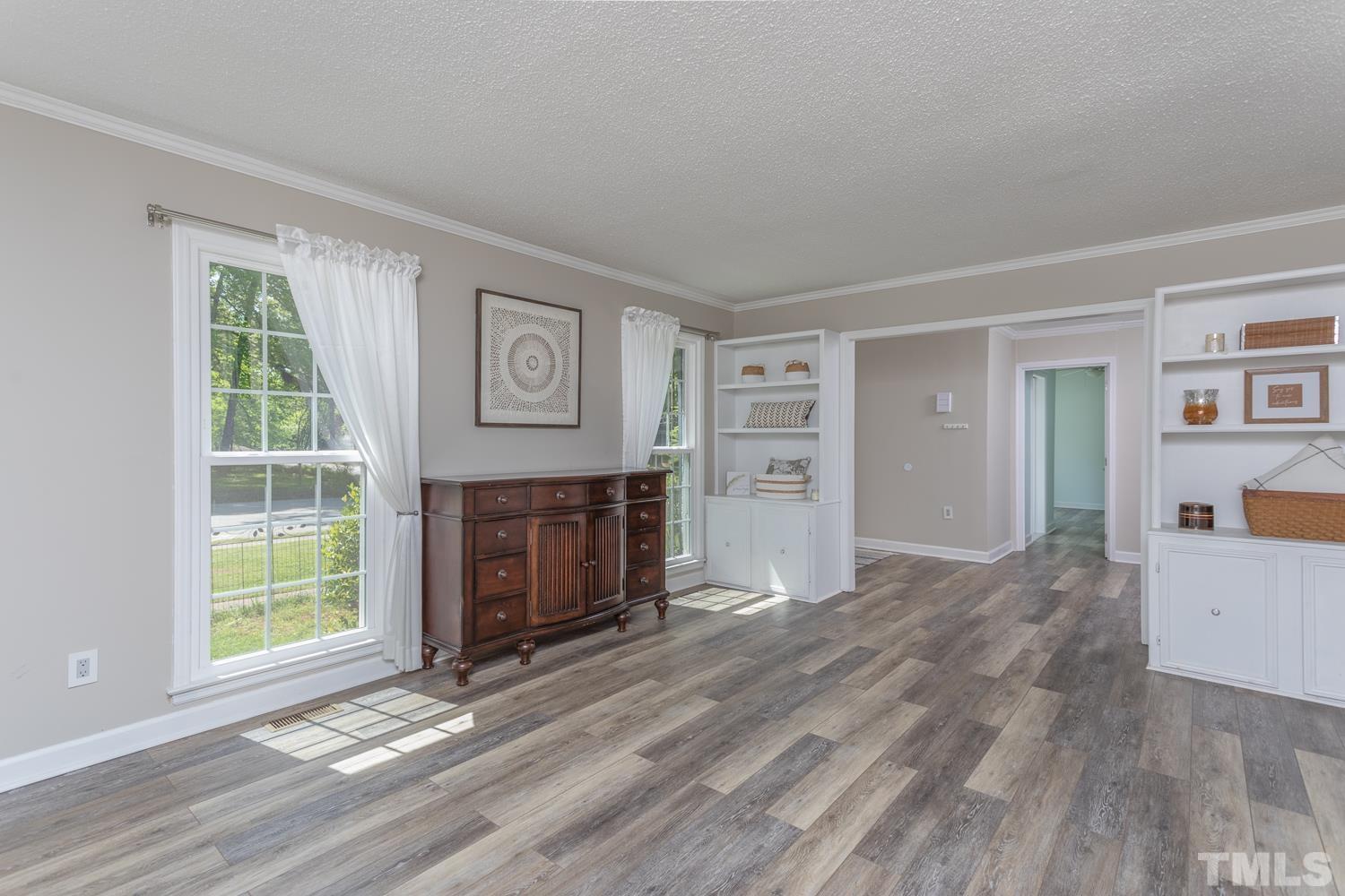 1304 Lake Pine Drive Cary, NC 27511 - Photo 6 of 26 a view of a livingroom with furniture and a window