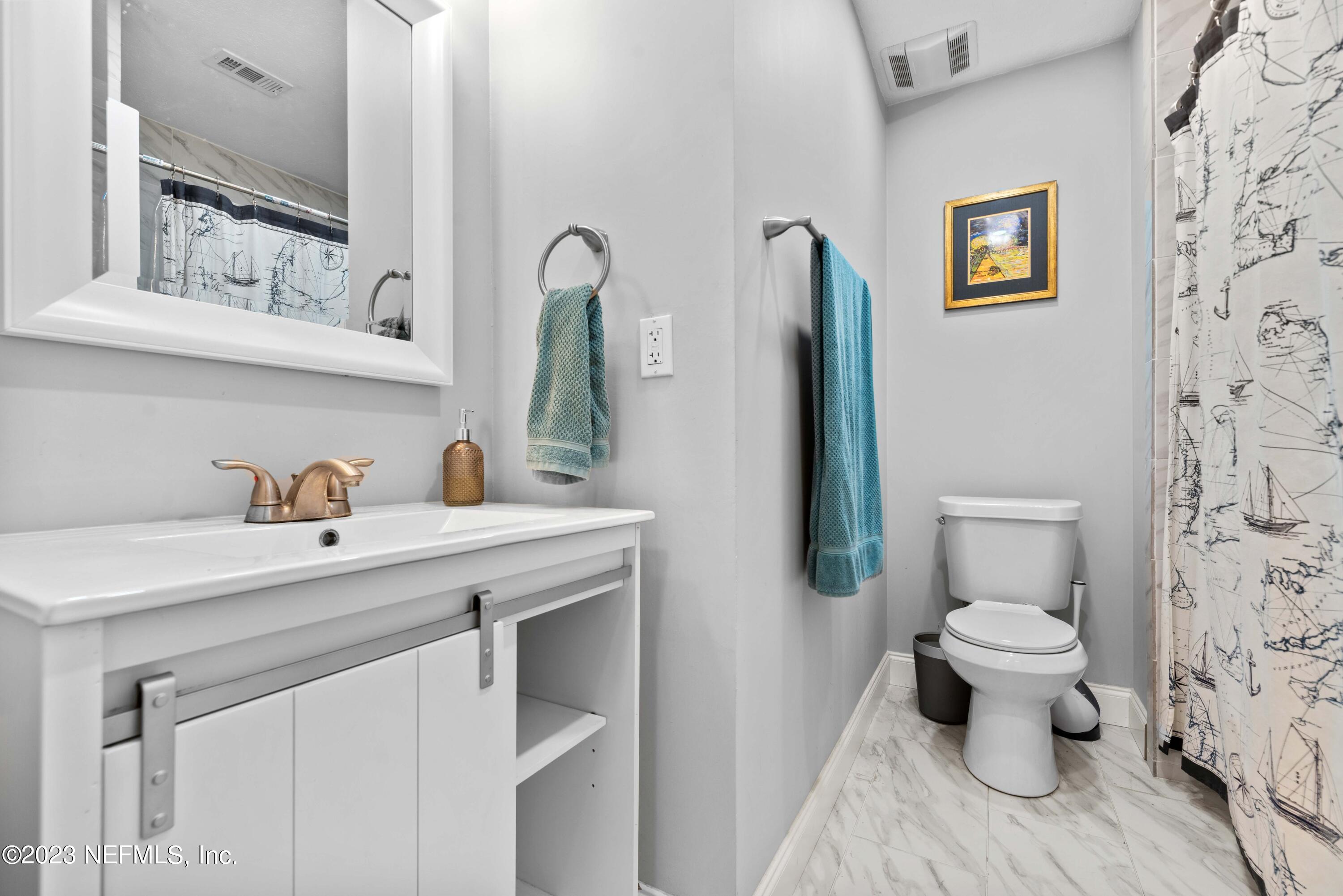 511 Gerona Road St. Augustine, FL 32086 - Photo 17 of 30 a view of a sink and a toilet
