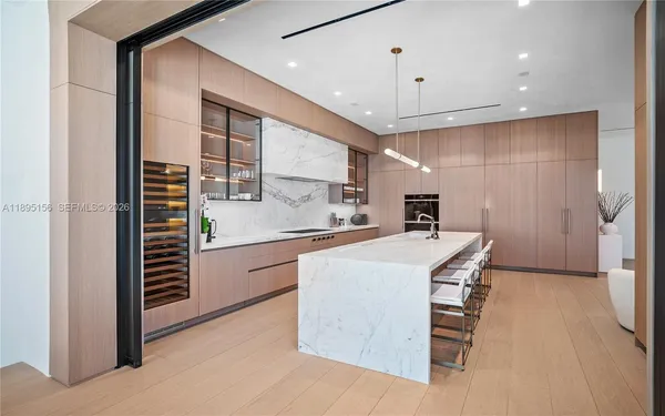 a spacious bedroom with a bed and a couch