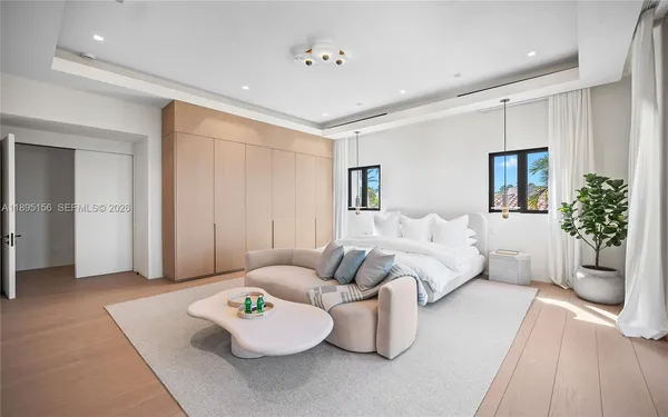 a bathroom with a granite countertop sink a toilet and a mirror