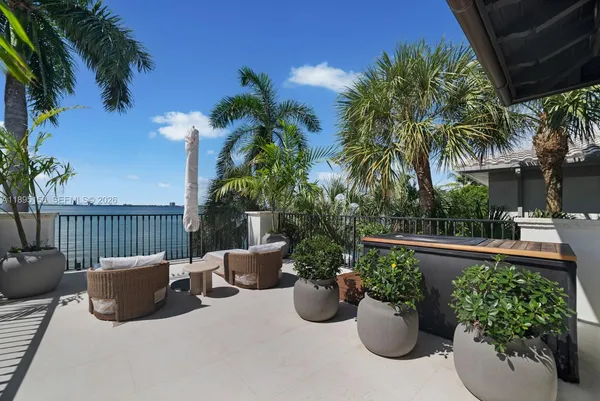 a front view of a house with swimming pool