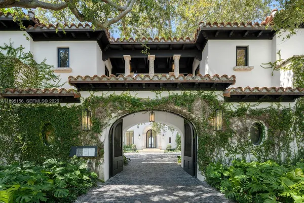 a view of a living room with wooden floor