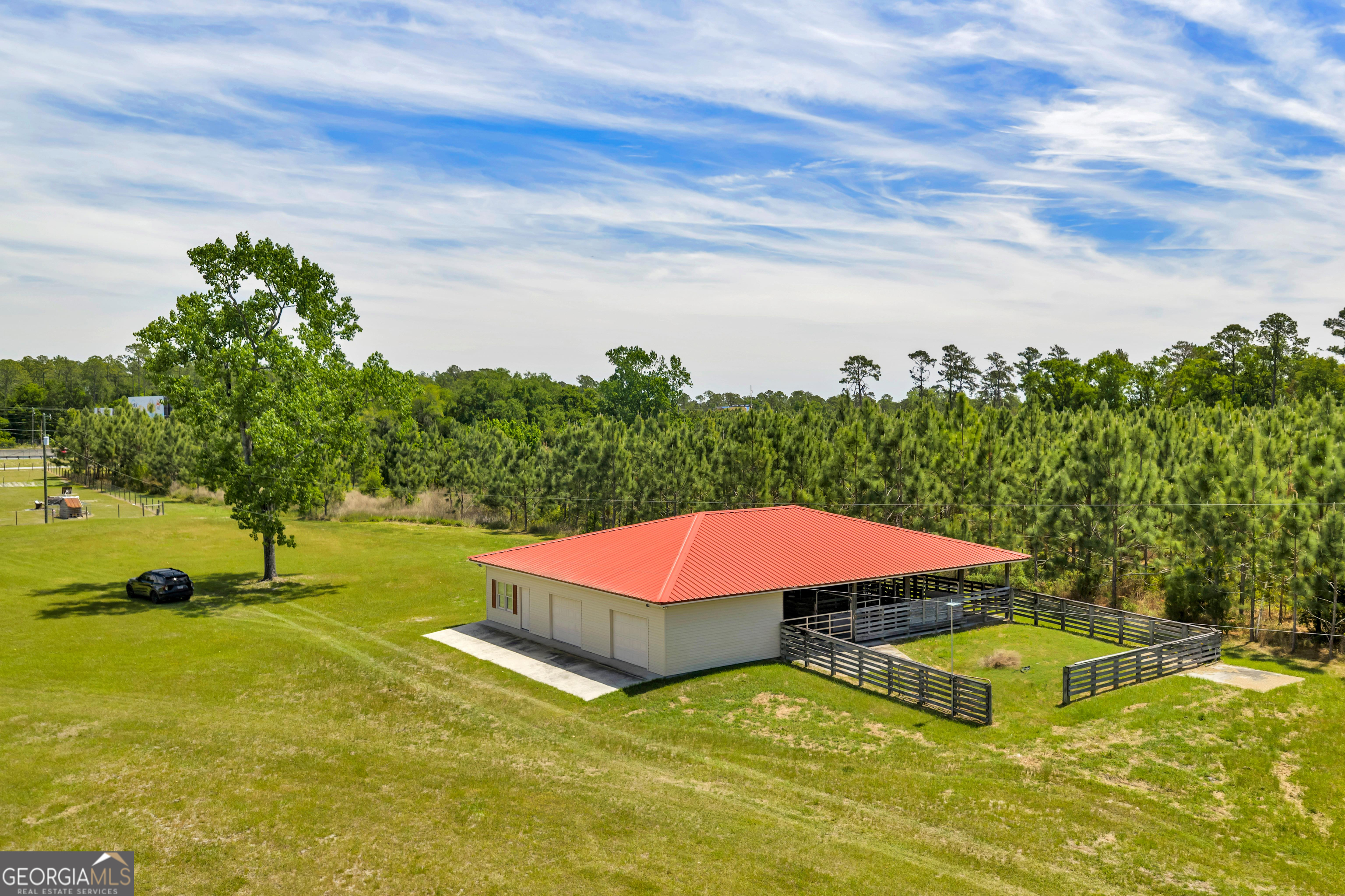 3807 Val Tech Road Valdosta, GA 31602 - Photo 19 of 39 a view of a swimming pool with an outdoor space and seating area