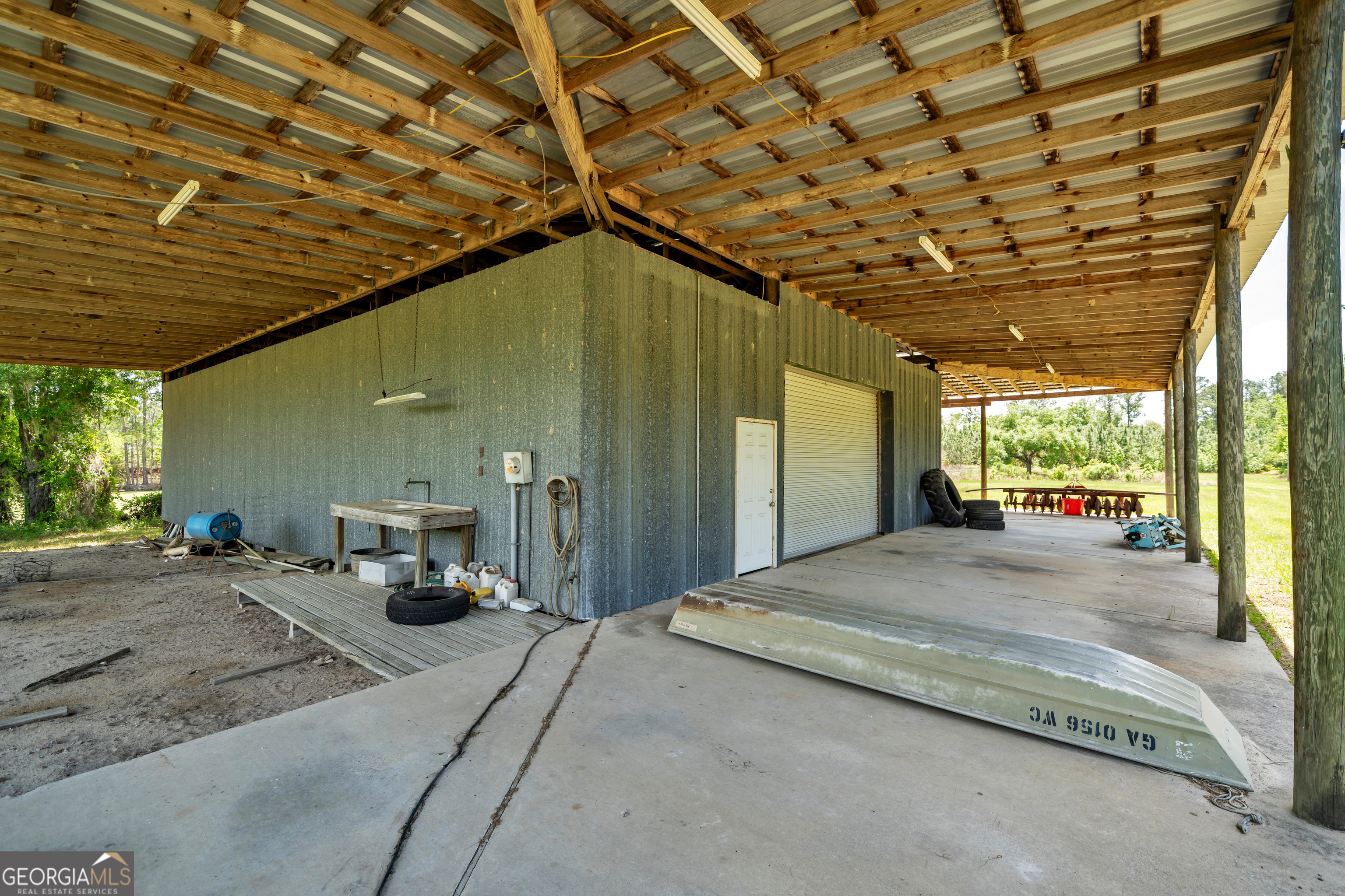 3807 Val Tech Road Valdosta, GA 31602 - Photo 32 of 39 a view of a porch with a patio