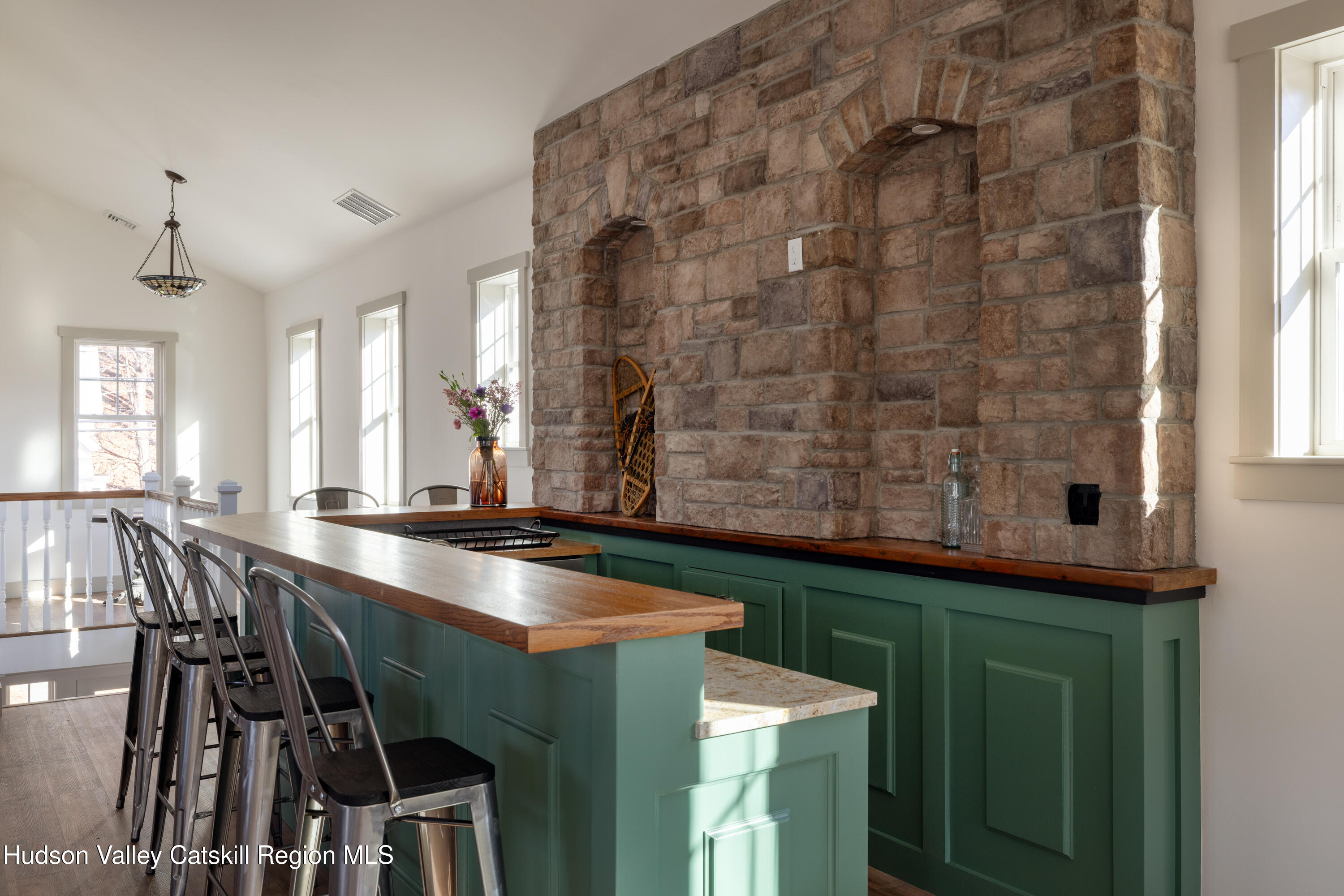 5433 Highway 23 Windham, NY 12496 - Photo 29 of 47 a dining table with chairs and chandelier