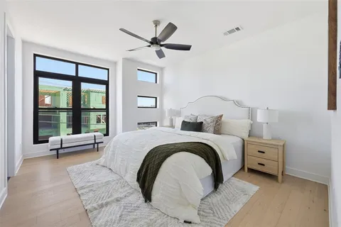 a bedroom with a bed and closet