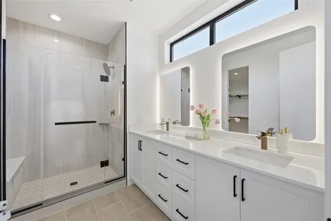 a bathroom with a toilet a sink and bathtub