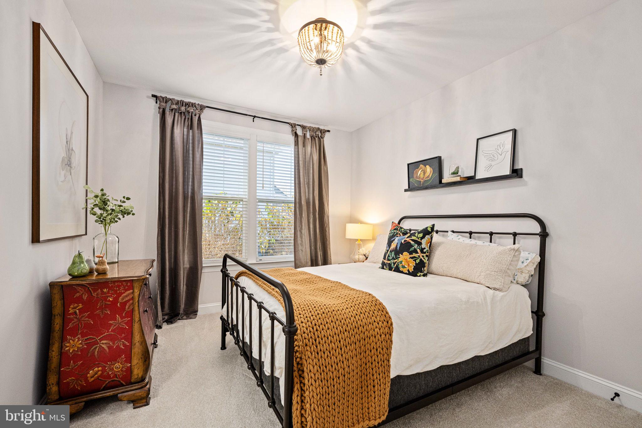 10908 Chatham Ridge Way Spotsylvania, VA 22551 - Photo 24 of 47 a bedroom with a bed and a window