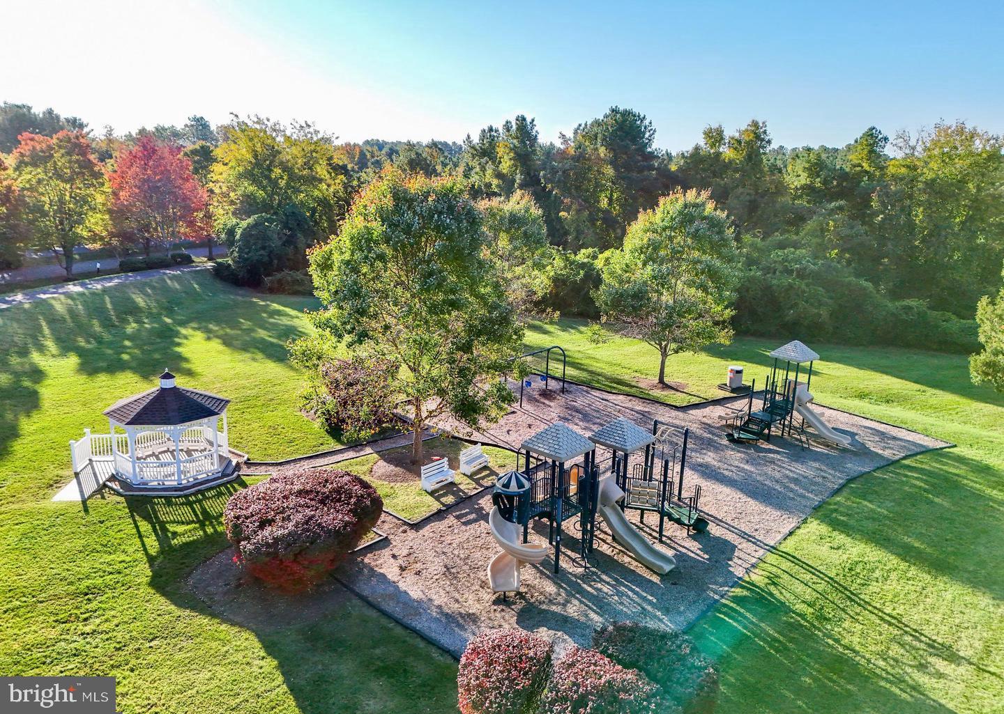 10908 Chatham Ridge Way Spotsylvania, VA 22551 - Photo 43 of 47 an aerial view of a house with garden space and lake view