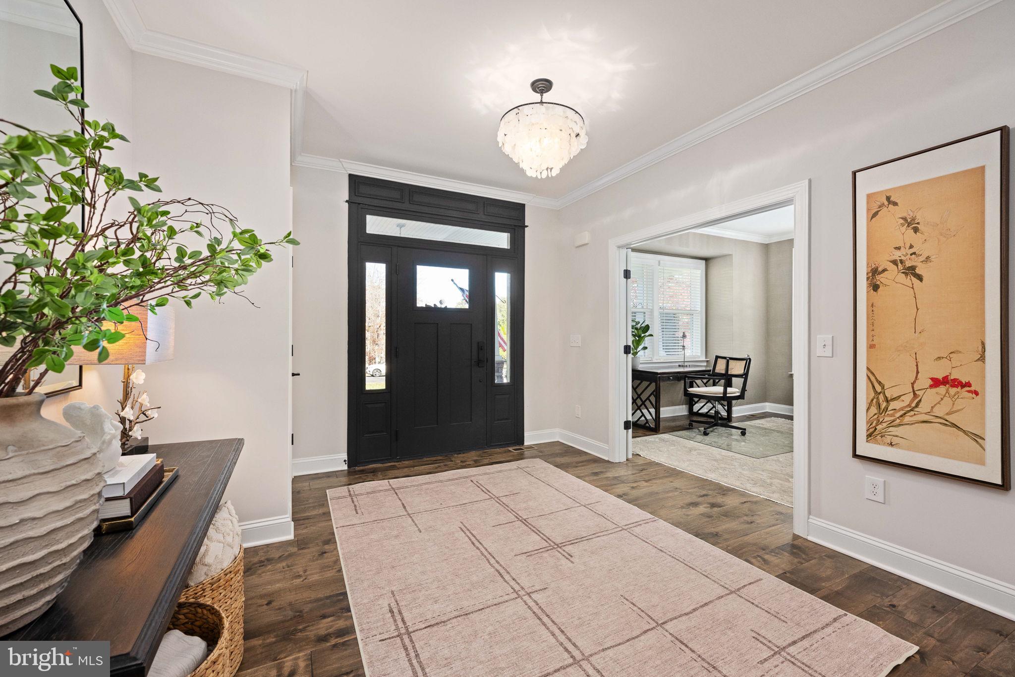 10908 Chatham Ridge Way Spotsylvania, VA 22551 - Photo 7 of 47 a view of a livingroom with furniture and a potted plant
