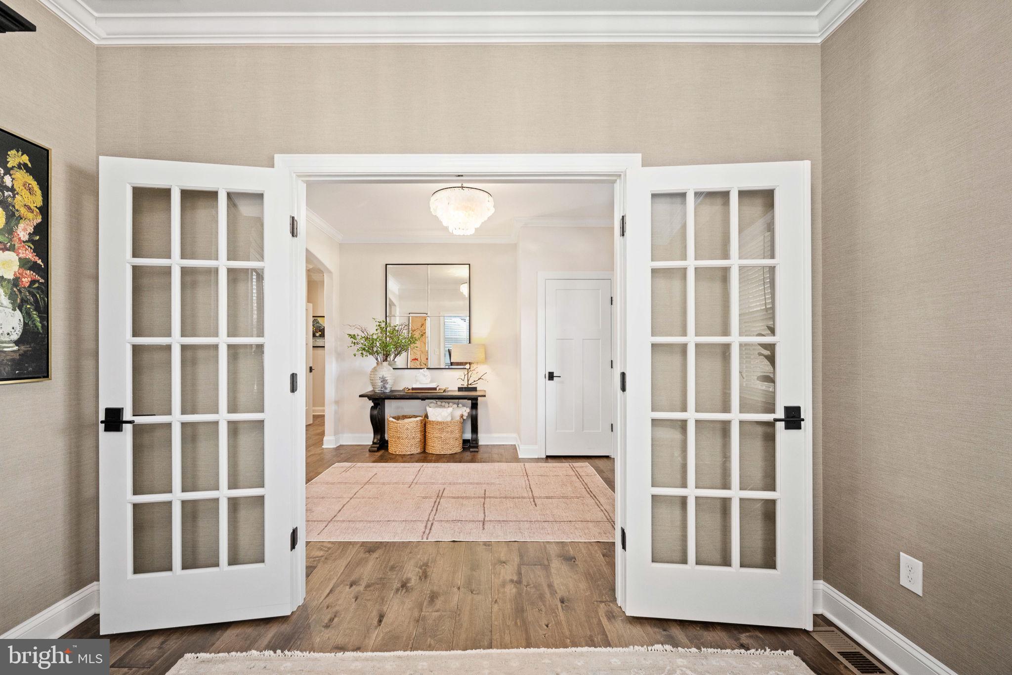 10908 Chatham Ridge Way Spotsylvania, VA 22551 - Photo 9 of 47 a view of a bedroom with wooden floor and a window