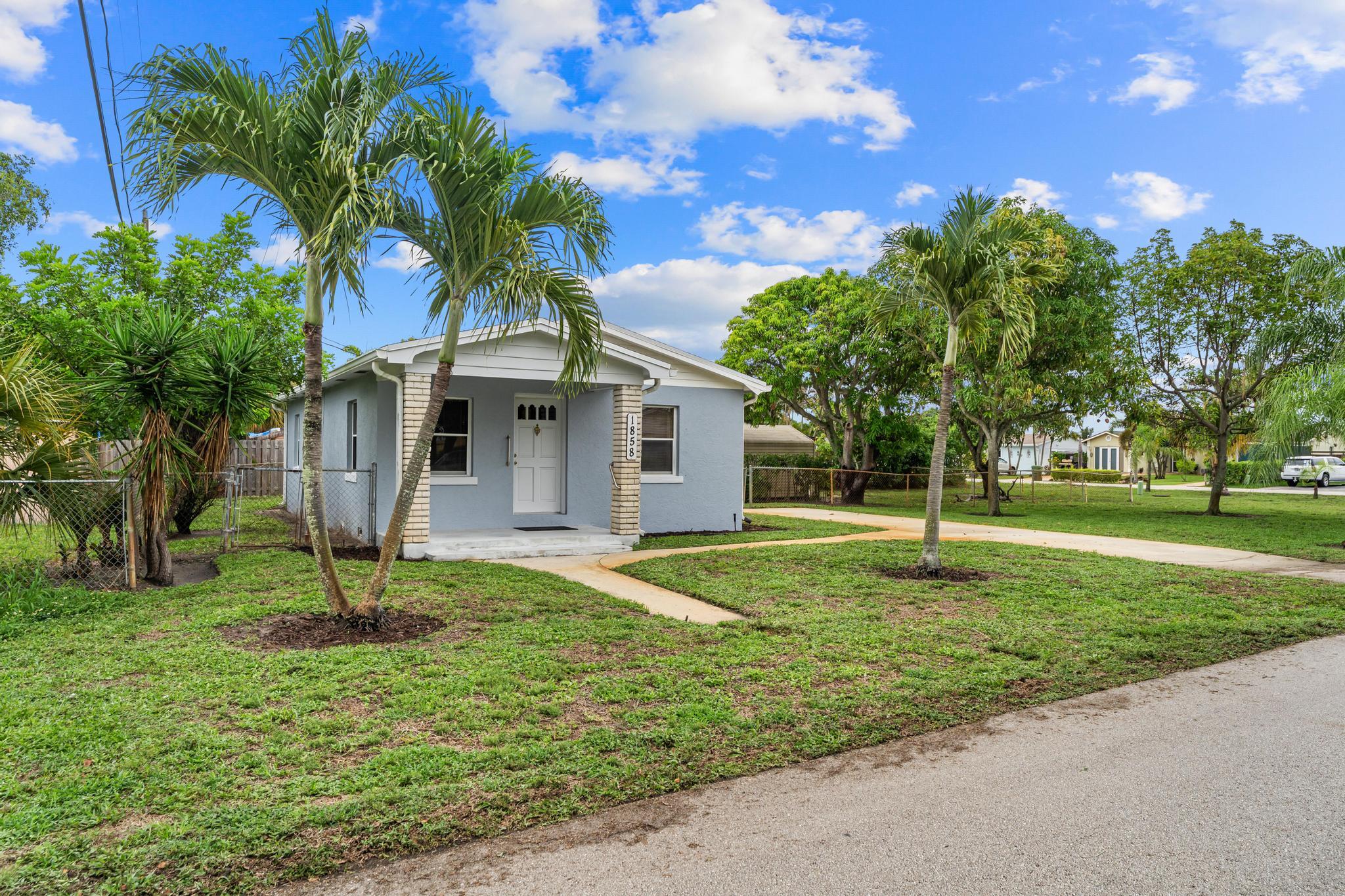 1858 Muskogee Road Palm Springs, FL 33406 - Photo 7 of 27 Front