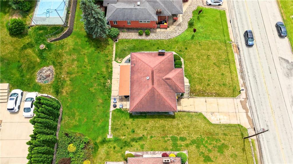 1642 Rostraver Road Belle Vernon, PA 15012 - Photo 30 of 32 swimming pool with outdoor seating and yard