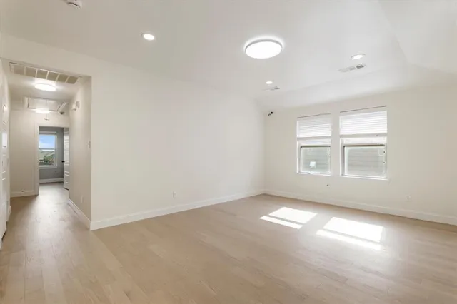 a view of a patio with a table and chairs
