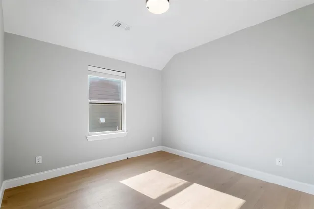 a view of house with yard and outdoor seating