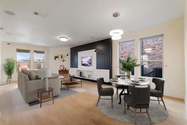 a view of a dining room with furniture window and outside view