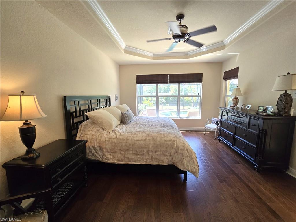 7887 Martino Circle Naples, FL 34112 - Photo 8 of 25 a living room with furniture fireplace and a window