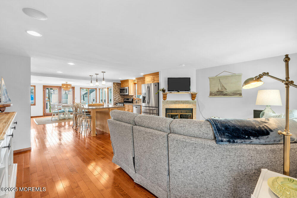 308 16th Avenue Belmar, NJ 07719 - Photo 11 of 54 a living room with furniture and a flat screen tv