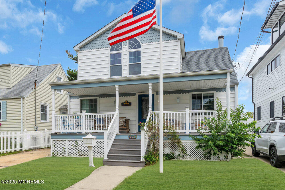308 16th Avenue Belmar, NJ 07719 - Photo 3 of 54 a front view of a house with a garden and plants