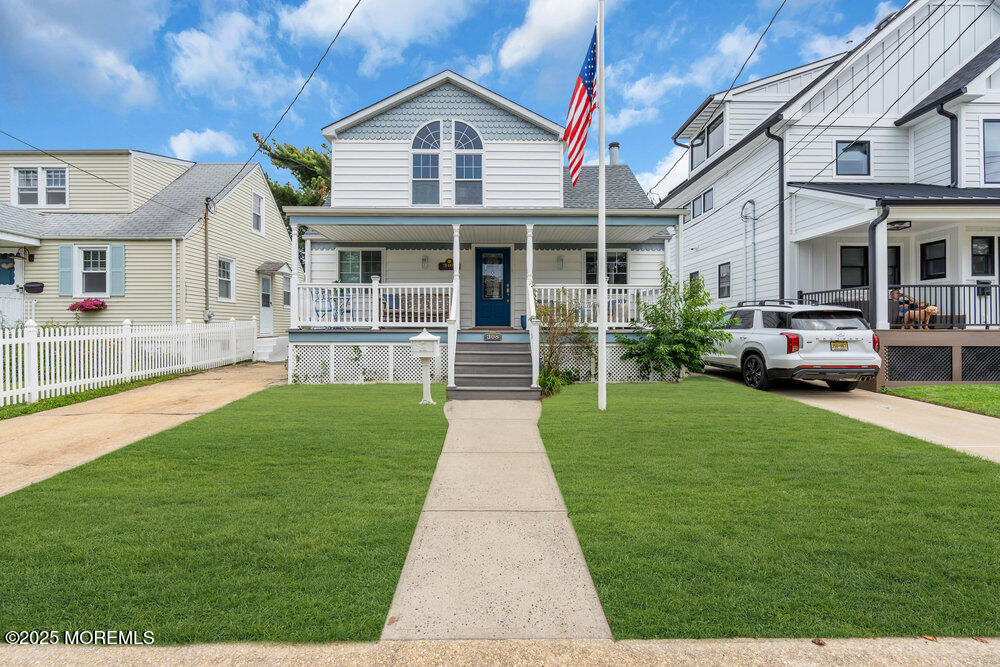 308 16th Avenue Belmar, NJ 07719 - Photo 4 of 54 a front view of multiple houses with yard