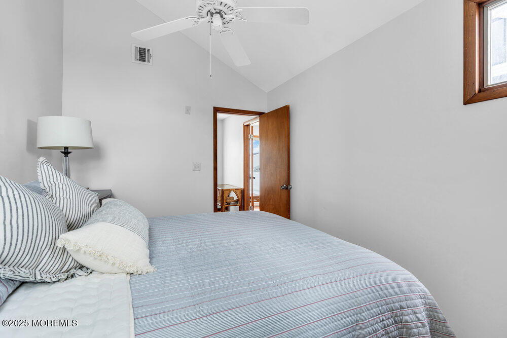 308 16th Avenue Belmar, NJ 07719 - Photo 41 of 54 a bedroom with a bed and a window