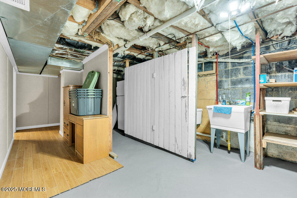 308 16th Avenue Belmar, NJ 07719 - Photo 46 of 54 a view of a porch with a table and chairs