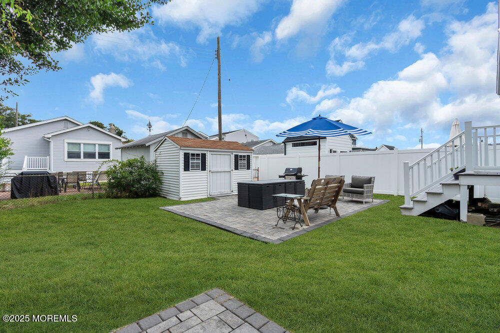 308 16th Avenue Belmar, NJ 07719 - Photo 50 of 54 a view of a house with backyard sitting area and garden