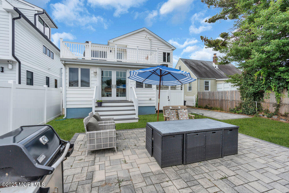 308 16th Avenue Belmar, NJ 07719 - Photo 53 of 54 a front view of a house with garden and patio