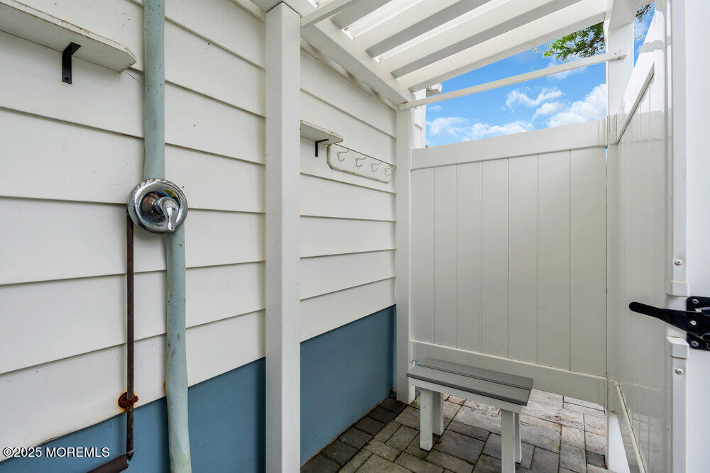308 16th Avenue Belmar, NJ 07719 - Photo 54 of 54 a bathroom with a shower and a sink