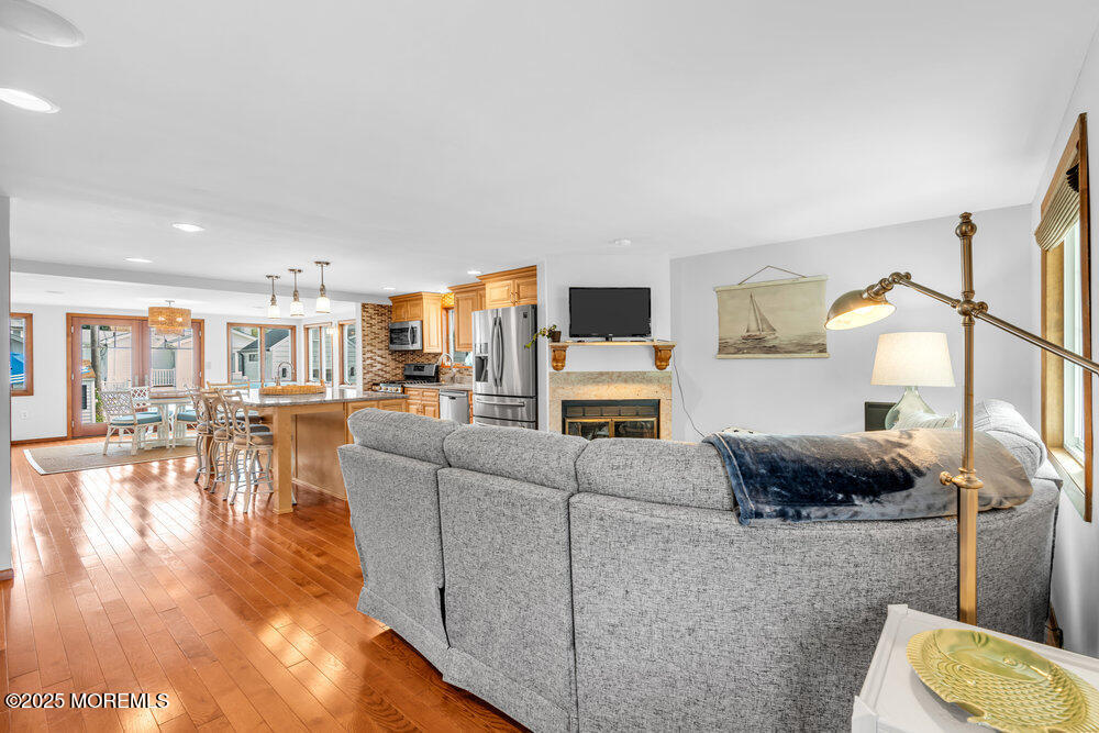 308 16th Avenue Belmar, NJ 07719 - Photo 10 of 54 a living room with furniture and a flat screen tv