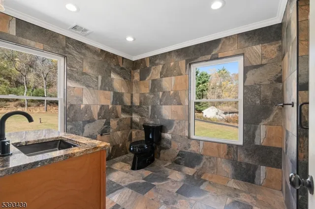 a view of a bathroom with a tub