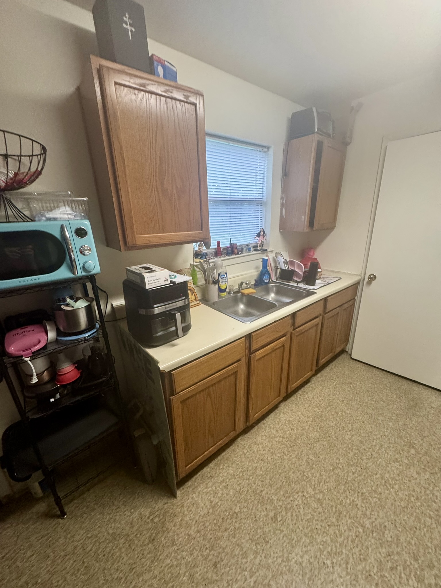 5 South 19th Street Temple, TX 76504 - Photo 5 of 16 a room with a sink a bed and a mirror