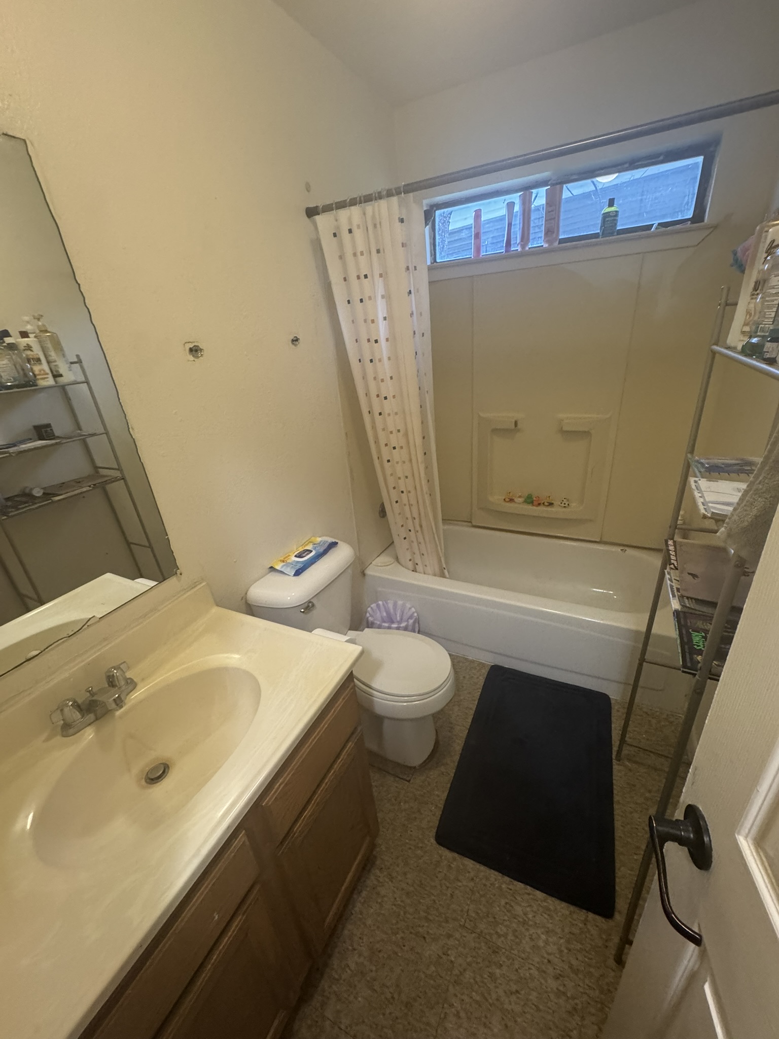 5 South 19th Street Temple, TX 76504 - Photo 10 of 16 a bathroom with a sink a toilet and shower