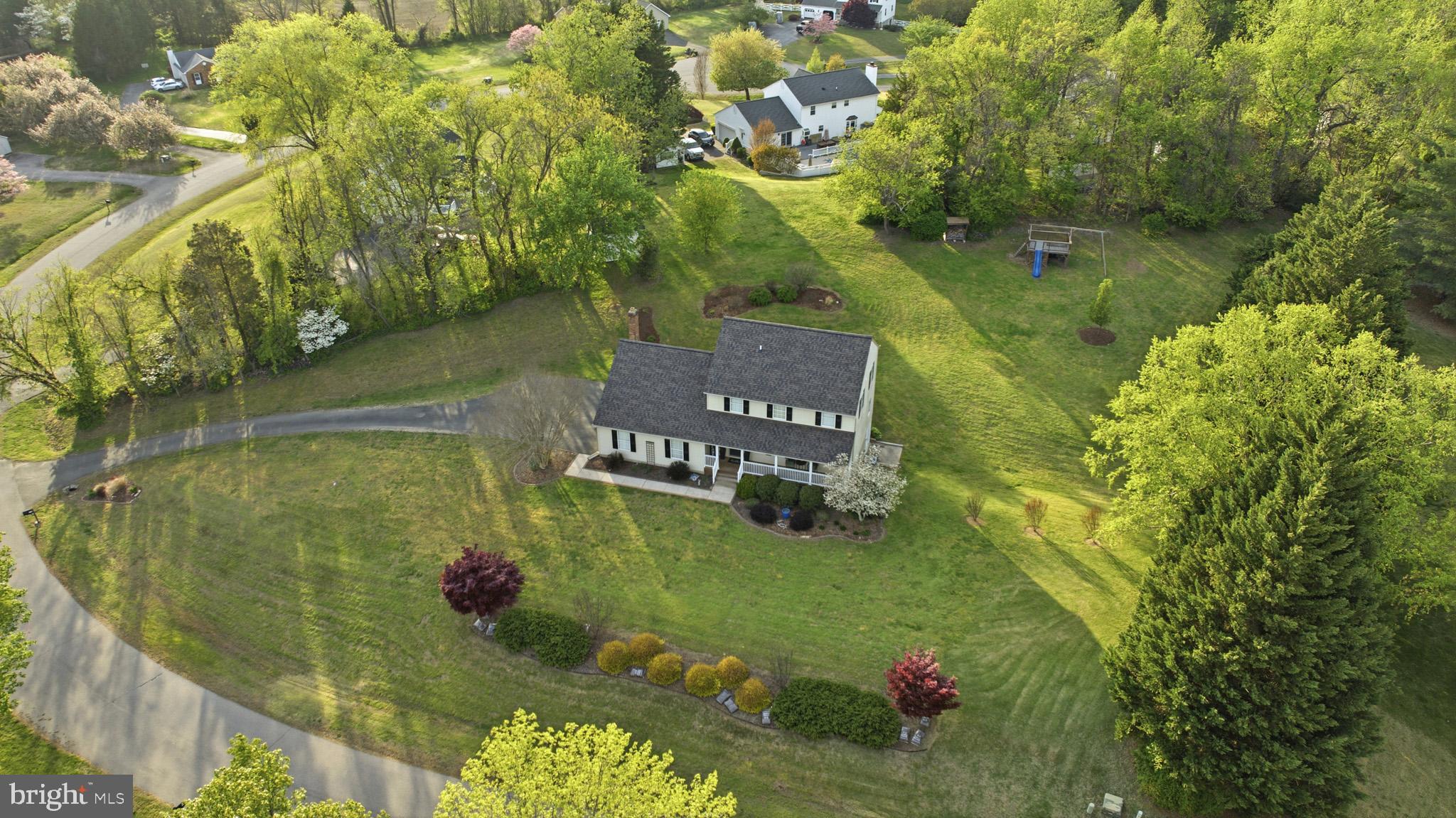 STUNNING 4-bed/3.5-bath on 1 acre in Owings!