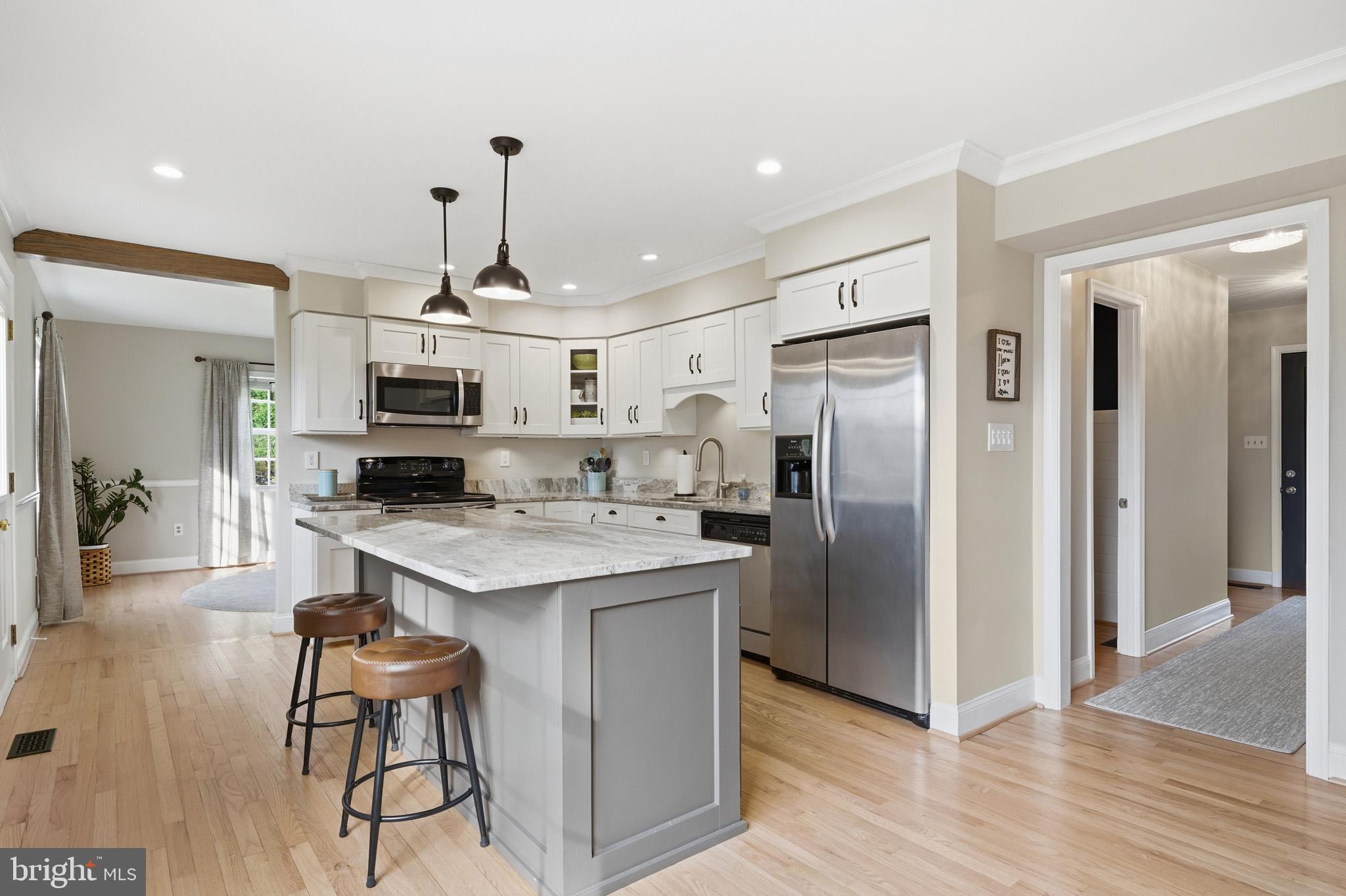 1707 Candlestick Way Owings, MD 20736 - Photo 14 of 59 Kitchen lsland is functional and has seating room.