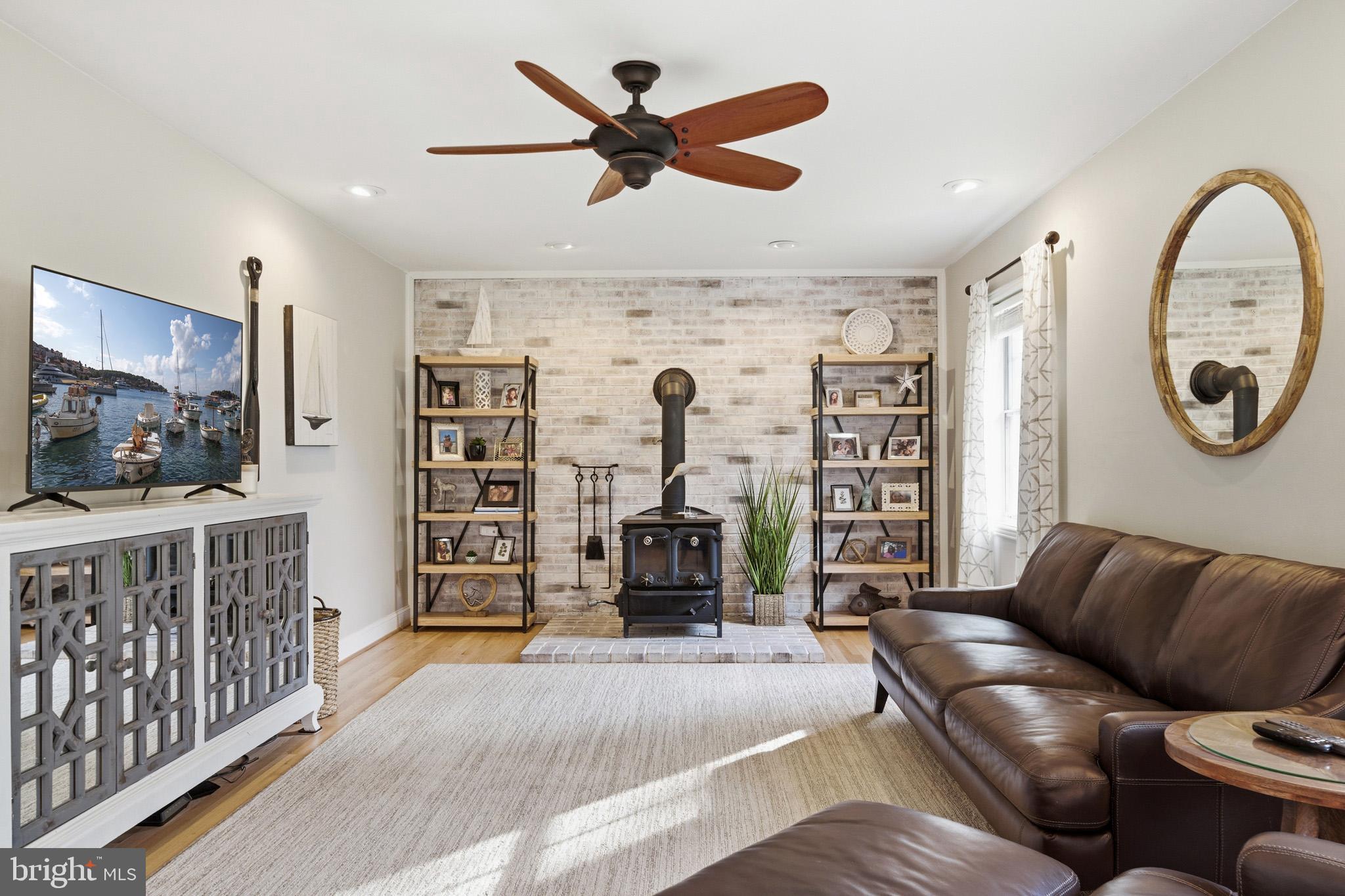 1707 Candlestick Way Owings, MD 20736 - Photo 22 of 59 Focal point wood stove is stunning.