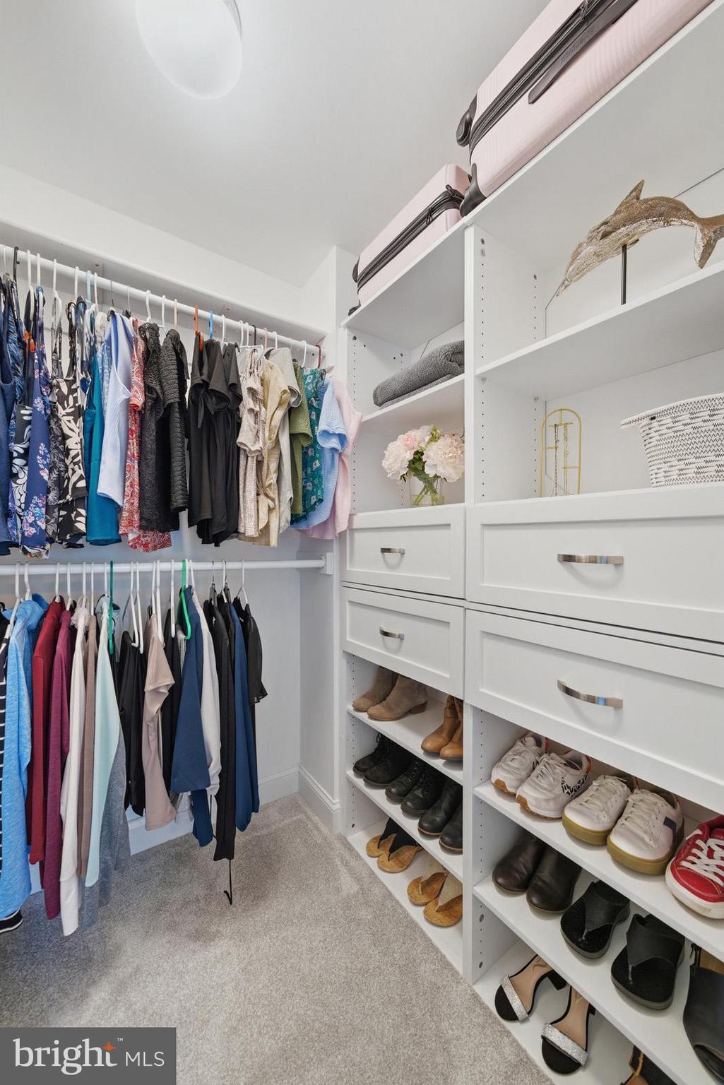 1707 Candlestick Way Owings, MD 20736 - Photo 28 of 59 Large walk-in closet with organization.