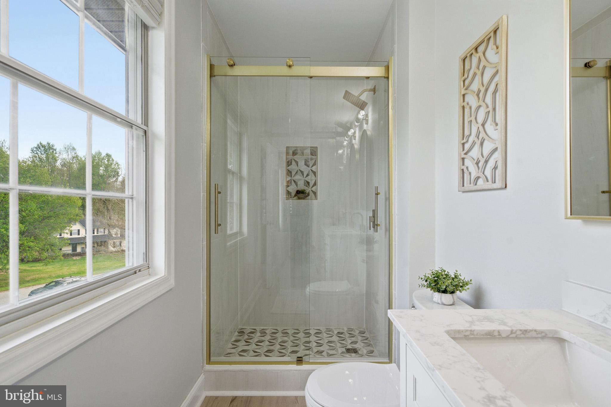 1707 Candlestick Way Owings, MD 20736 - Photo 30 of 59 Beautifully tiled shower and window is lovely.