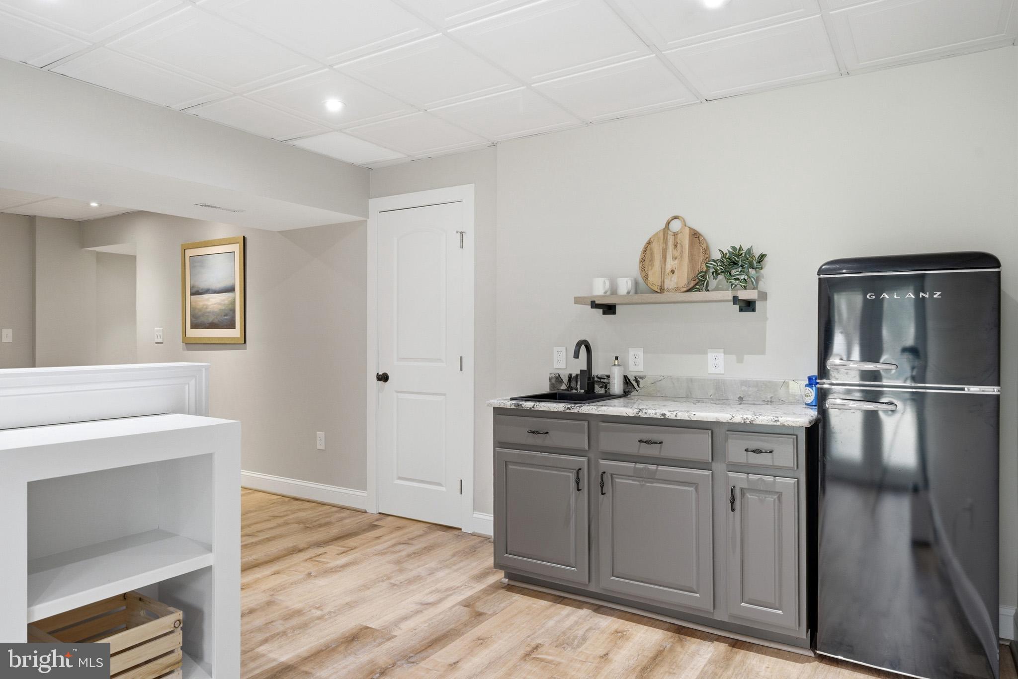 1707 Candlestick Way Owings, MD 20736 - Photo 41 of 59 Wet bar area is great for the basement level.