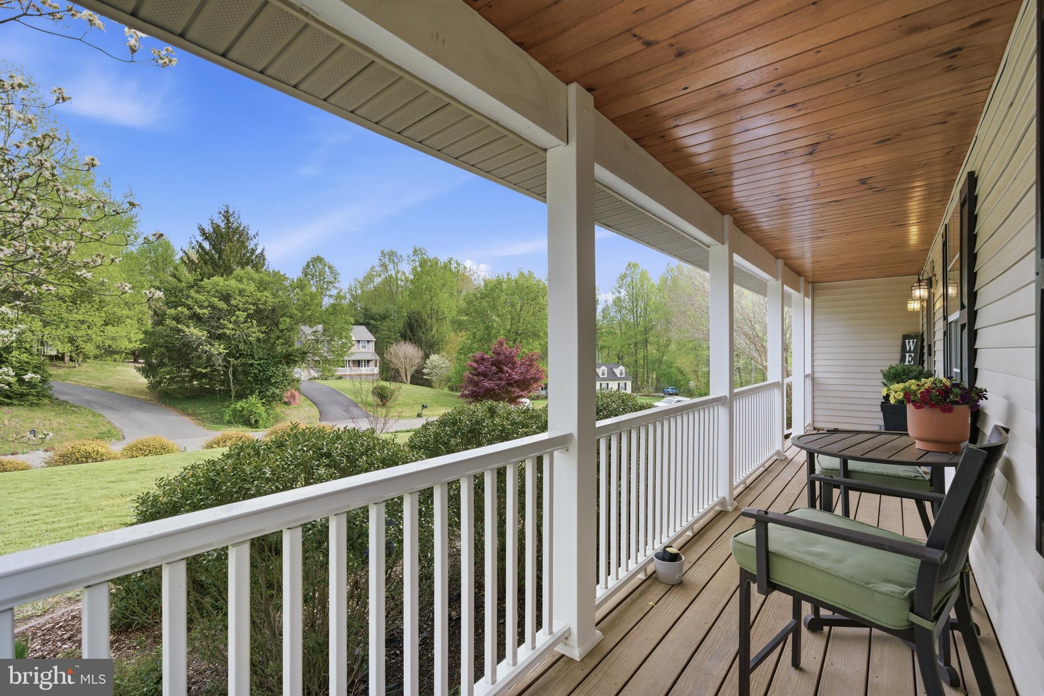 1707 Candlestick Way Owings, MD 20736 - Photo 5 of 59 Enjoy coffee or a beverage on the front porch.