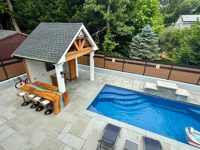 a view of deck with patio table and chairs