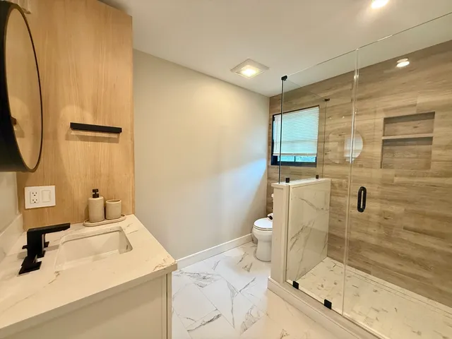 a view of a workspace with furniture