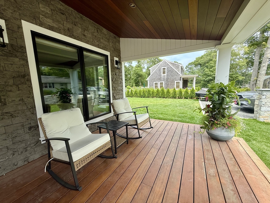 14 Bernard Circle Tisbury, MA 02568 - Photo 40 of 41 a view of a couches in patio of a house