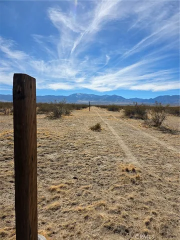 a view of ocean with a beach
