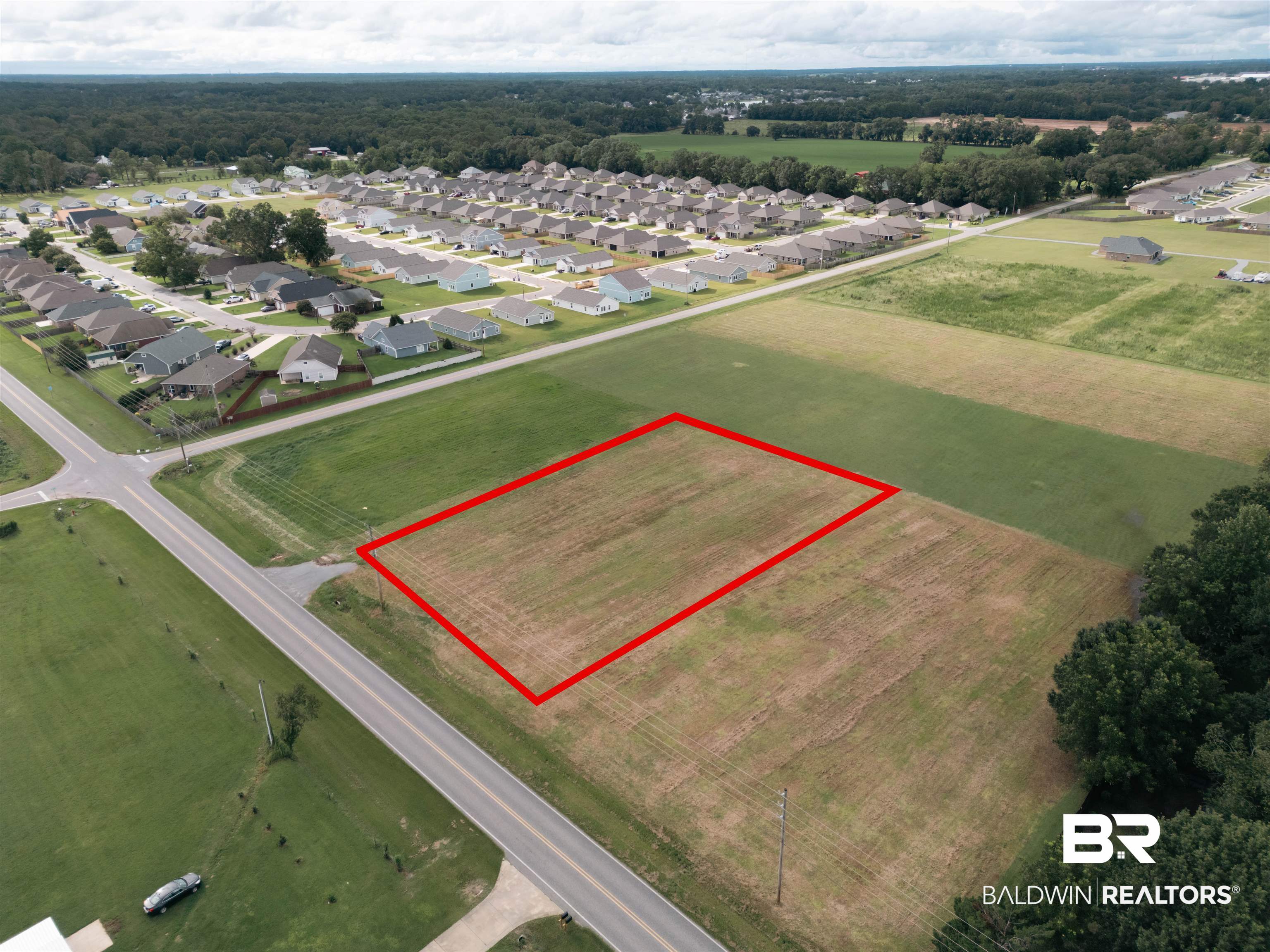 17127 East Thompson Road Robertsdale, AL 36567 - Photo 16 of 20 Aerial perspective of suburban area with property boundaries highlighted