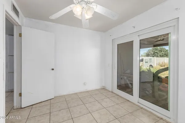 a view of an empty room and window
