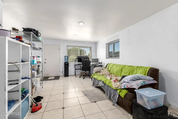 a living room with furniture and a couch