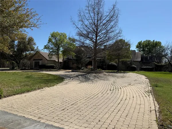 a view of backyard with green space